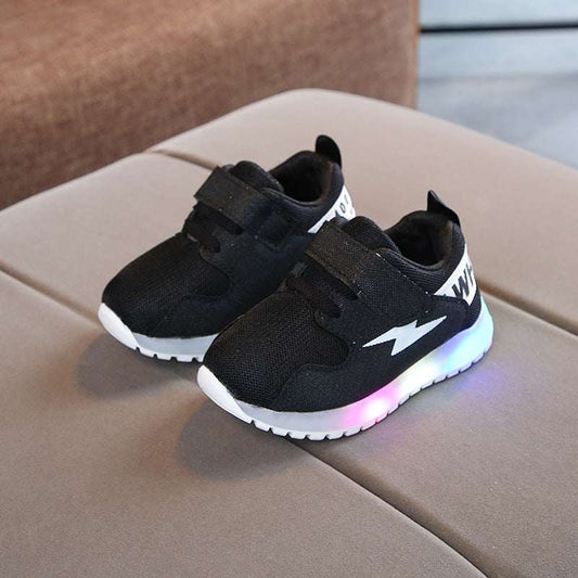 Black kids mesh sports shoes with hook-and-loop straps, lightning logo, LED light sole