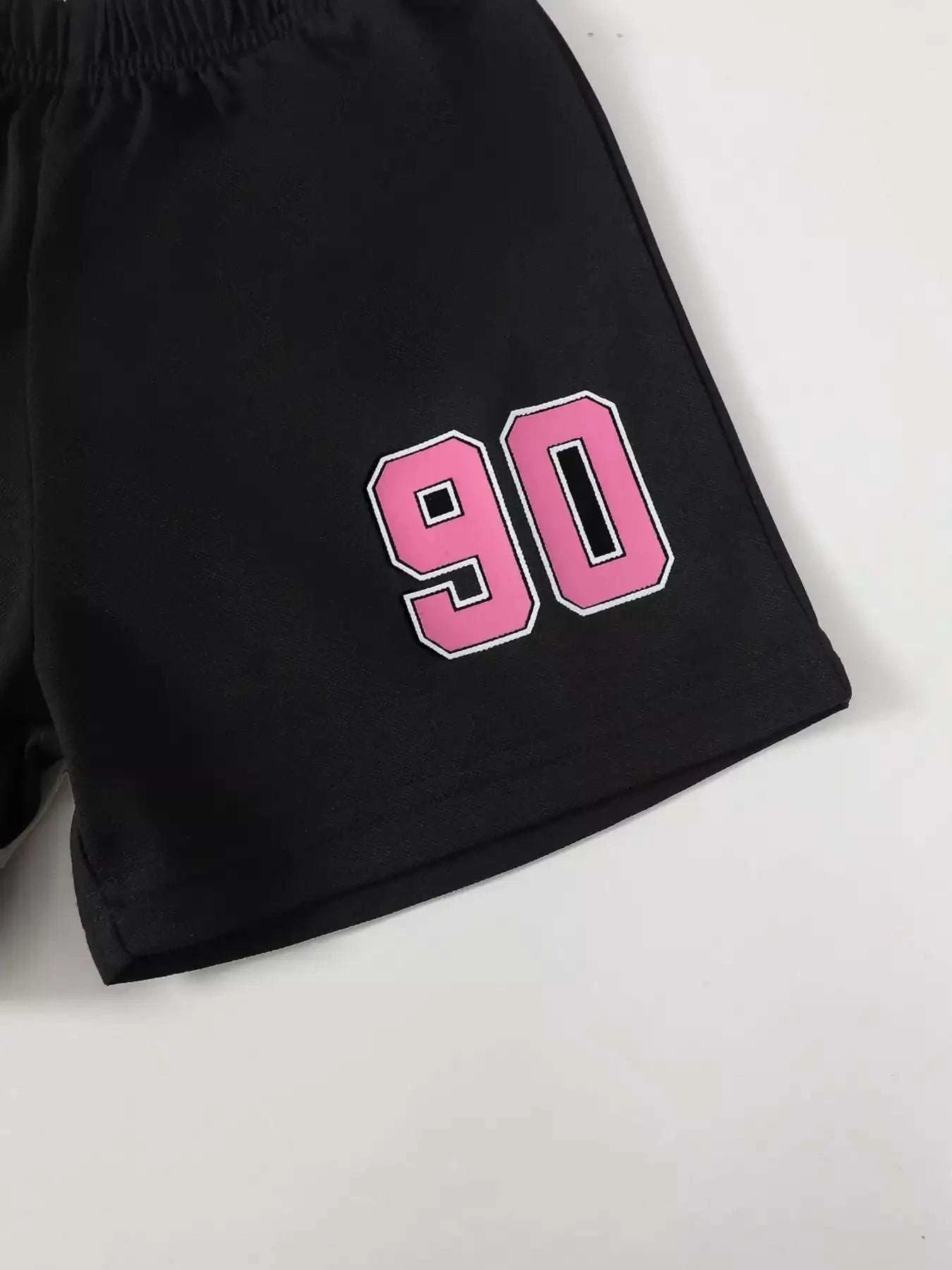 Kids black shorts with '90' number graphic in pink and white