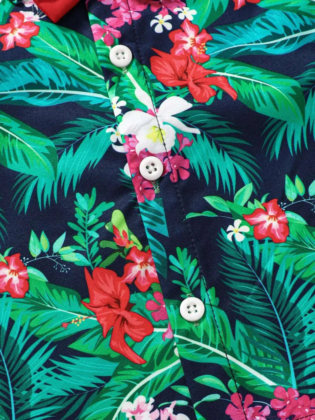 Kids tropical print shirt front with white buttons and floral leaf pattern