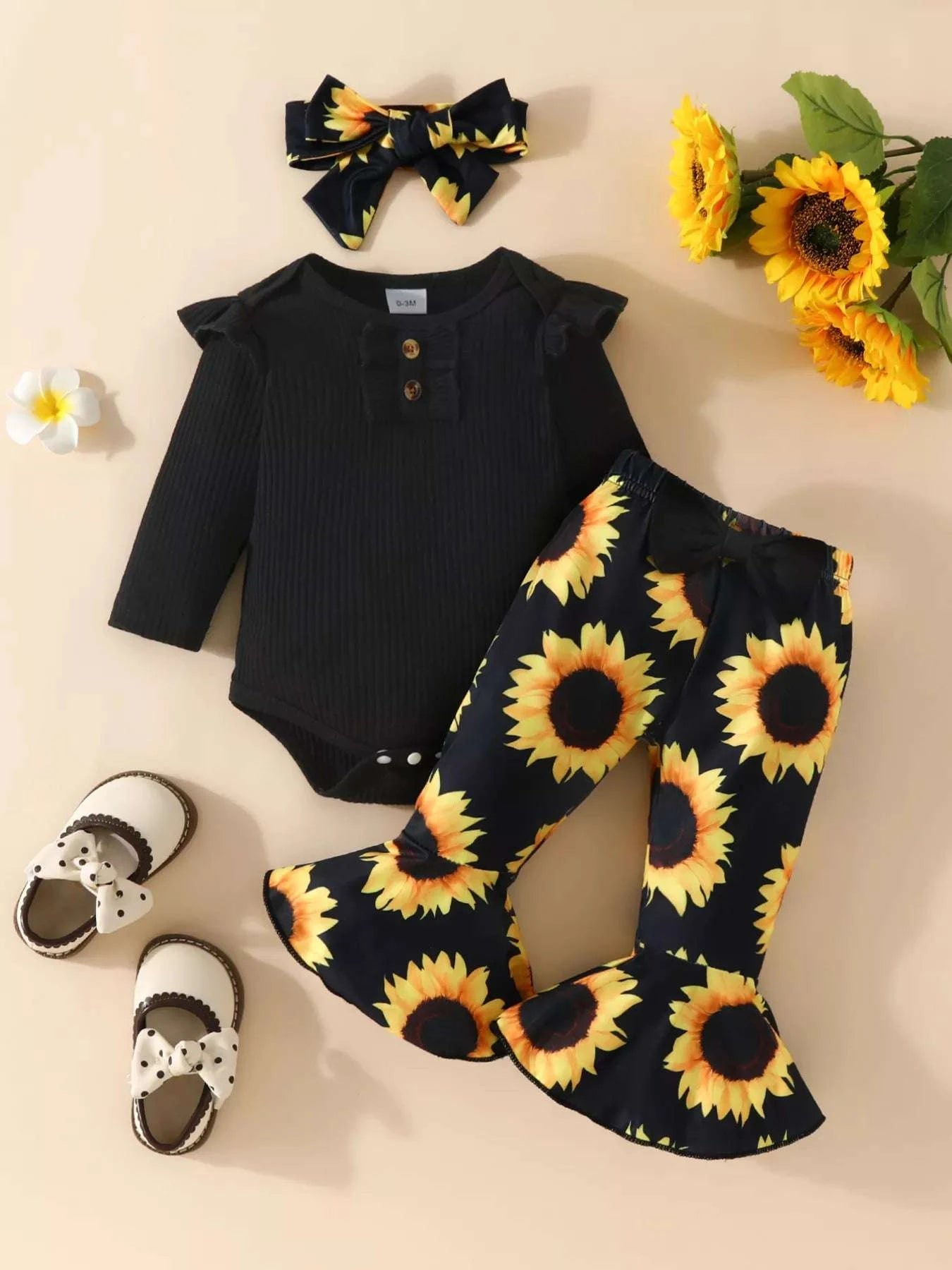 Black ruffled ribbed bodysuit with sunflower flare pants set and bow headband