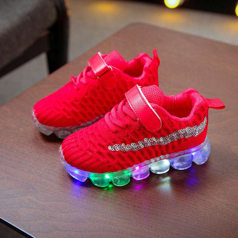 Children's LED light sneakers in bright red, hook-and-loop closure, multi-color glowing soles