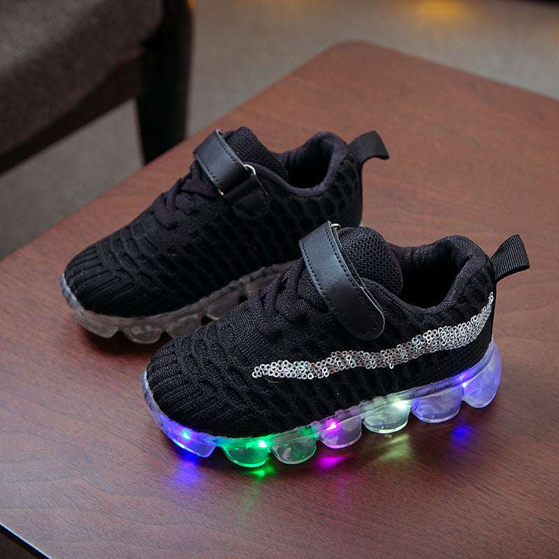 Kids' LED light sneakers in black, hook-and-loop strap, side stripe with glowing outsole