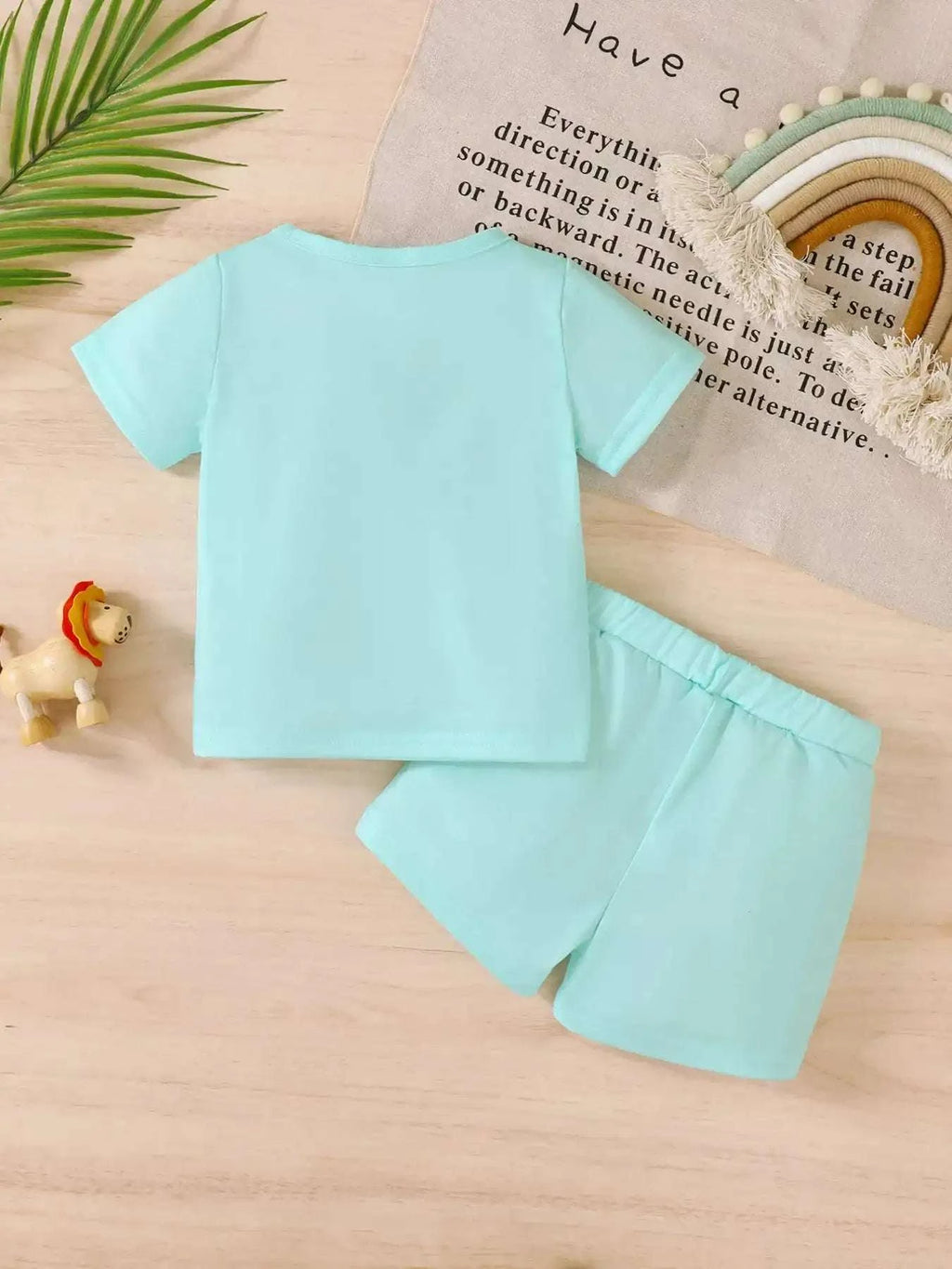 Light blue short-sleeve top and shorts set, plain front