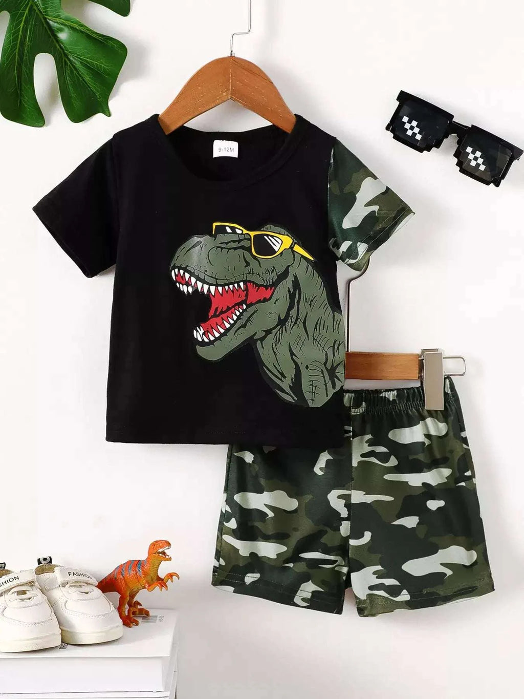 Black kids' dinosaur graphic tee and green camo shorts set, crew neck and elastic waist