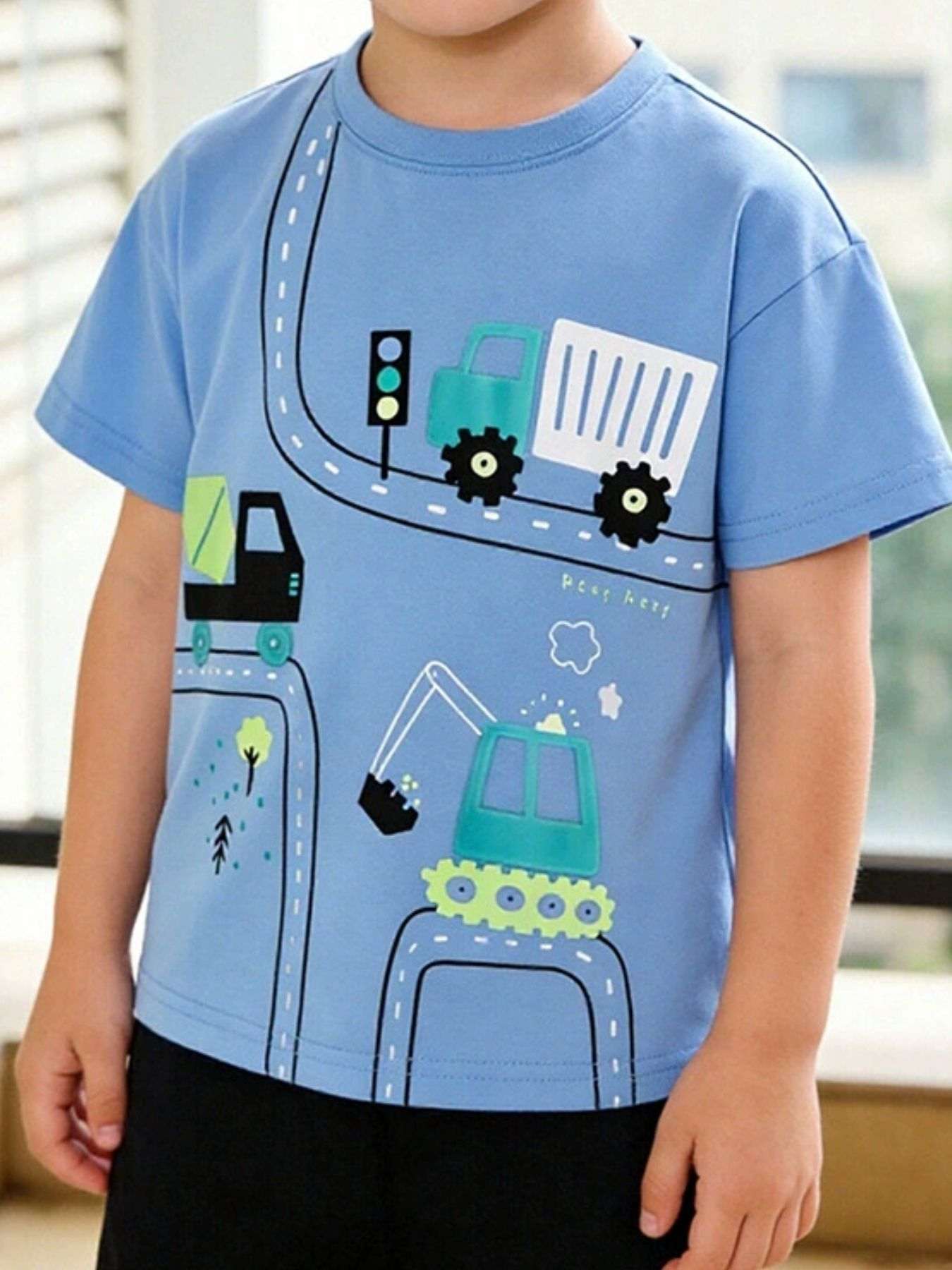 Sky blue kids short-sleeve T-shirt with colorful construction vehicle graphic