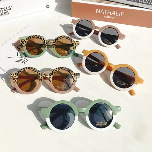 Kids round sunglasses set with leopard and colored frames, dark tinted lenses, UV protection.