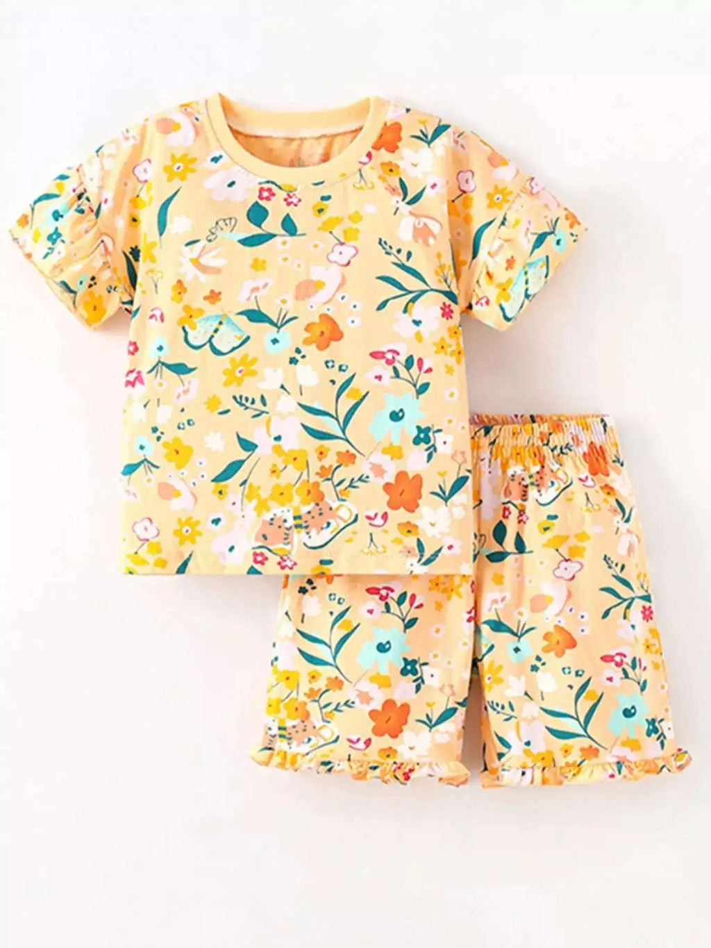 Kids floral print T-shirt and shorts set with soft ruffle trim, yellow-gold background