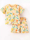 Kids floral print T-shirt and shorts set with soft ruffle trim, yellow-gold background