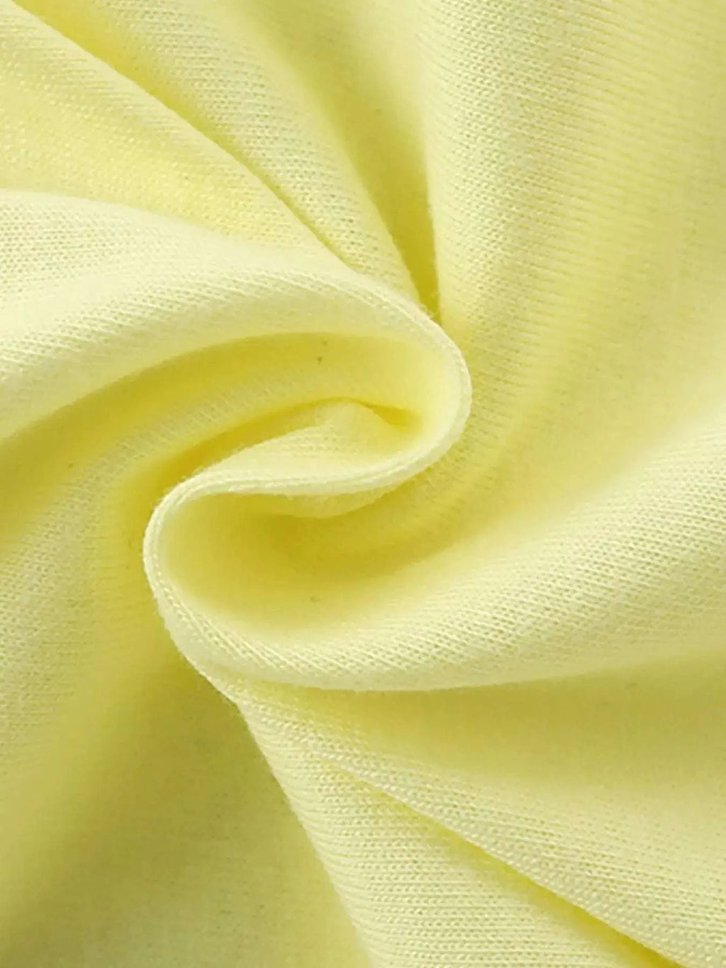 Light yellow kids T-shirt fabric close-up, soft jersey knit