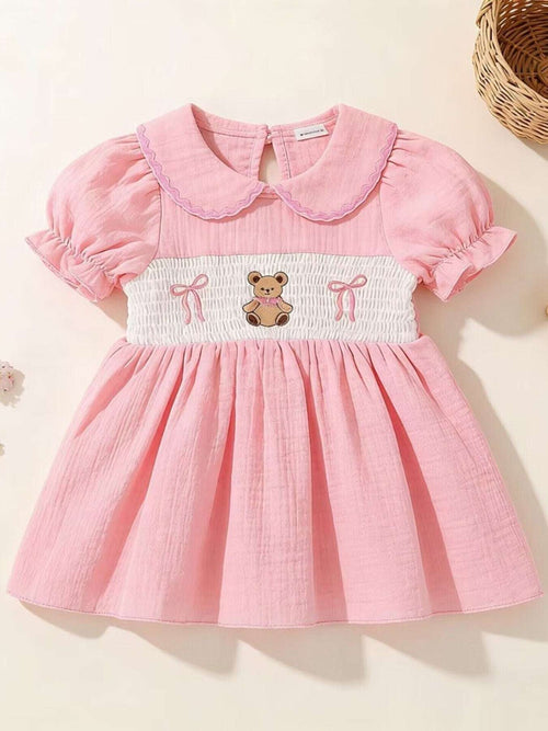 Pink children’s bear embroidered smocked dress with Peter Pan collar and puff sleeves
