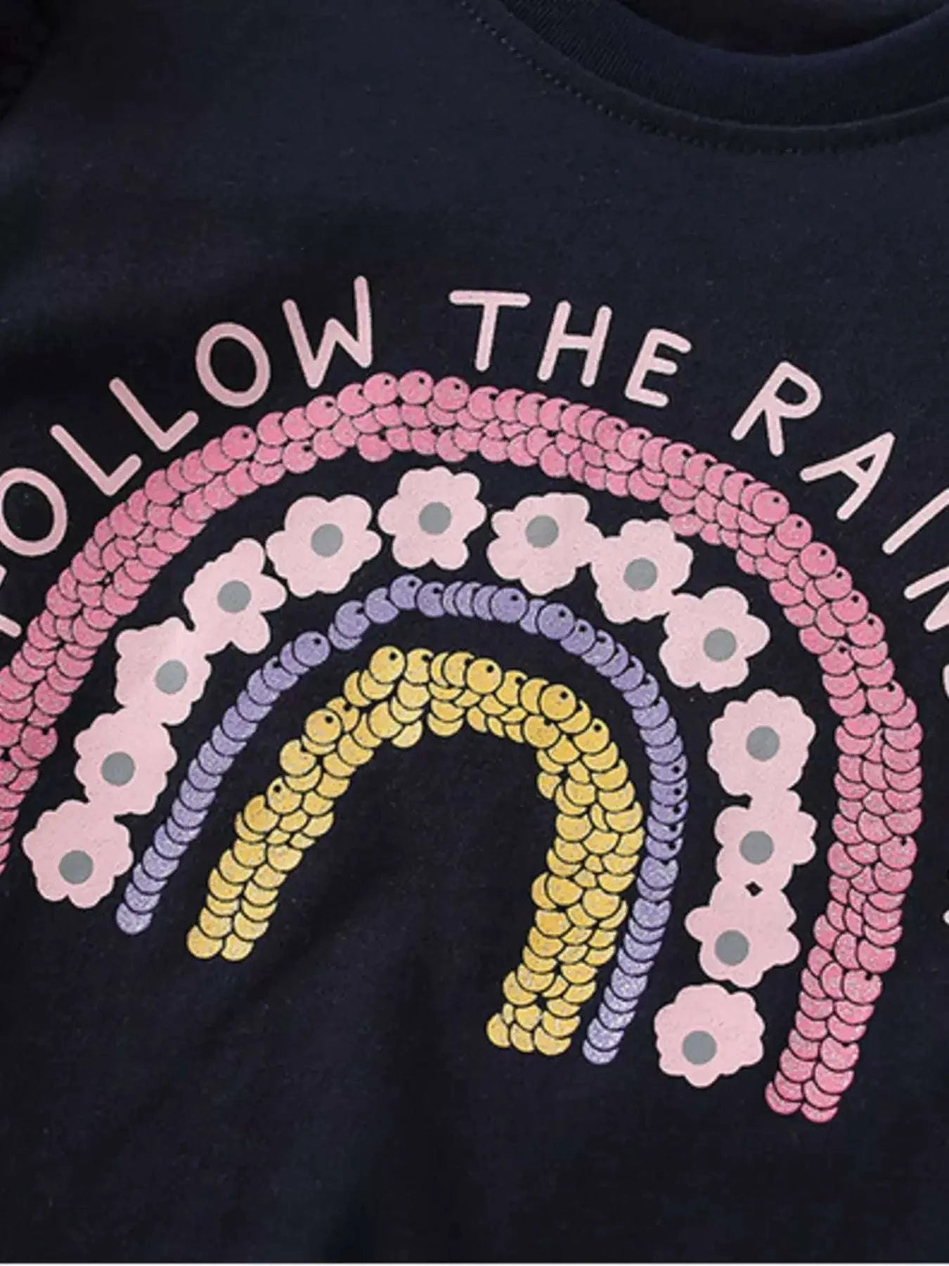 Kids dark T-shirt with rainbow sequined graphic and curved text across chest