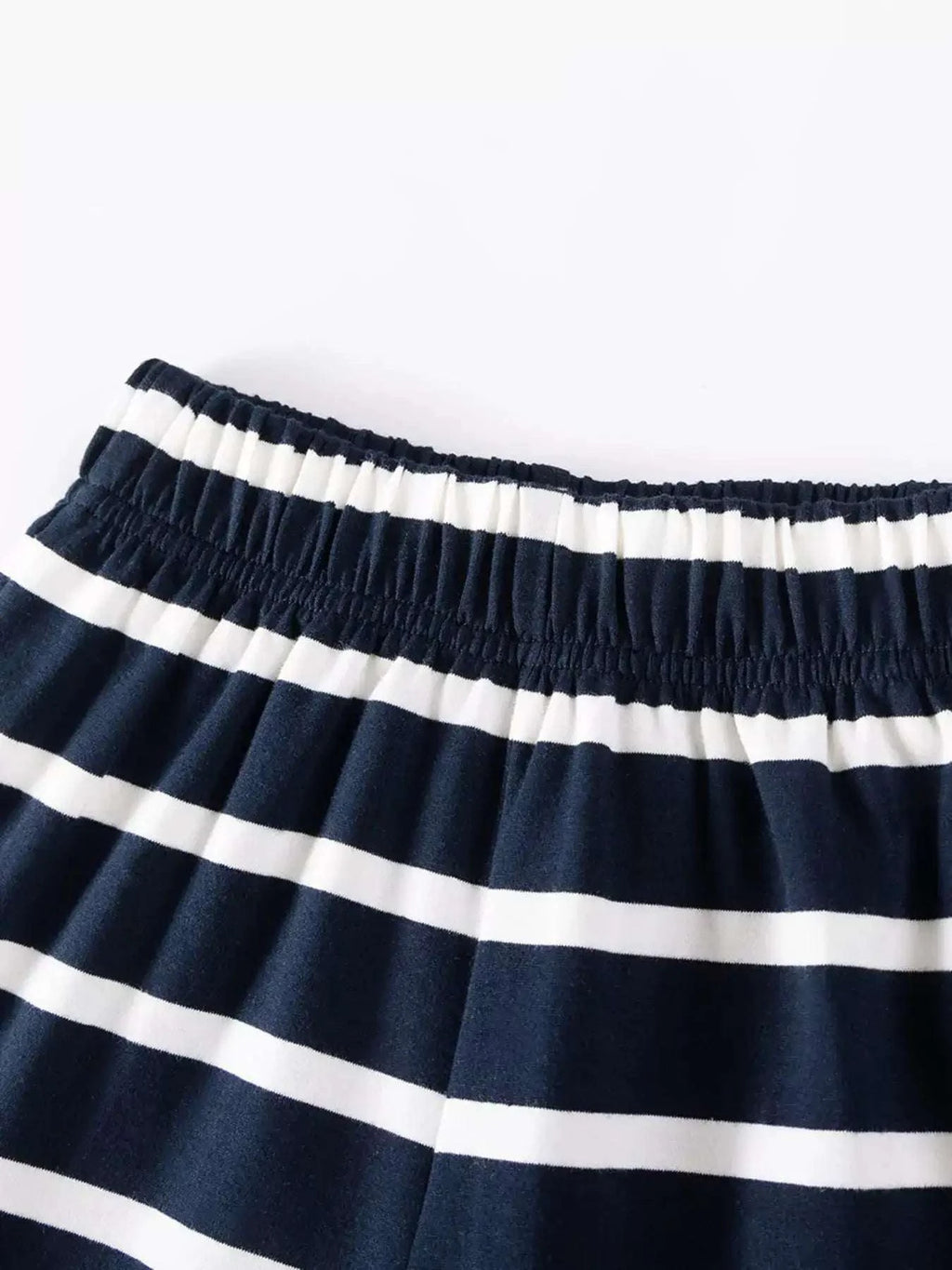 Navy-and-white striped shorts with elastic waistband and gathered hem