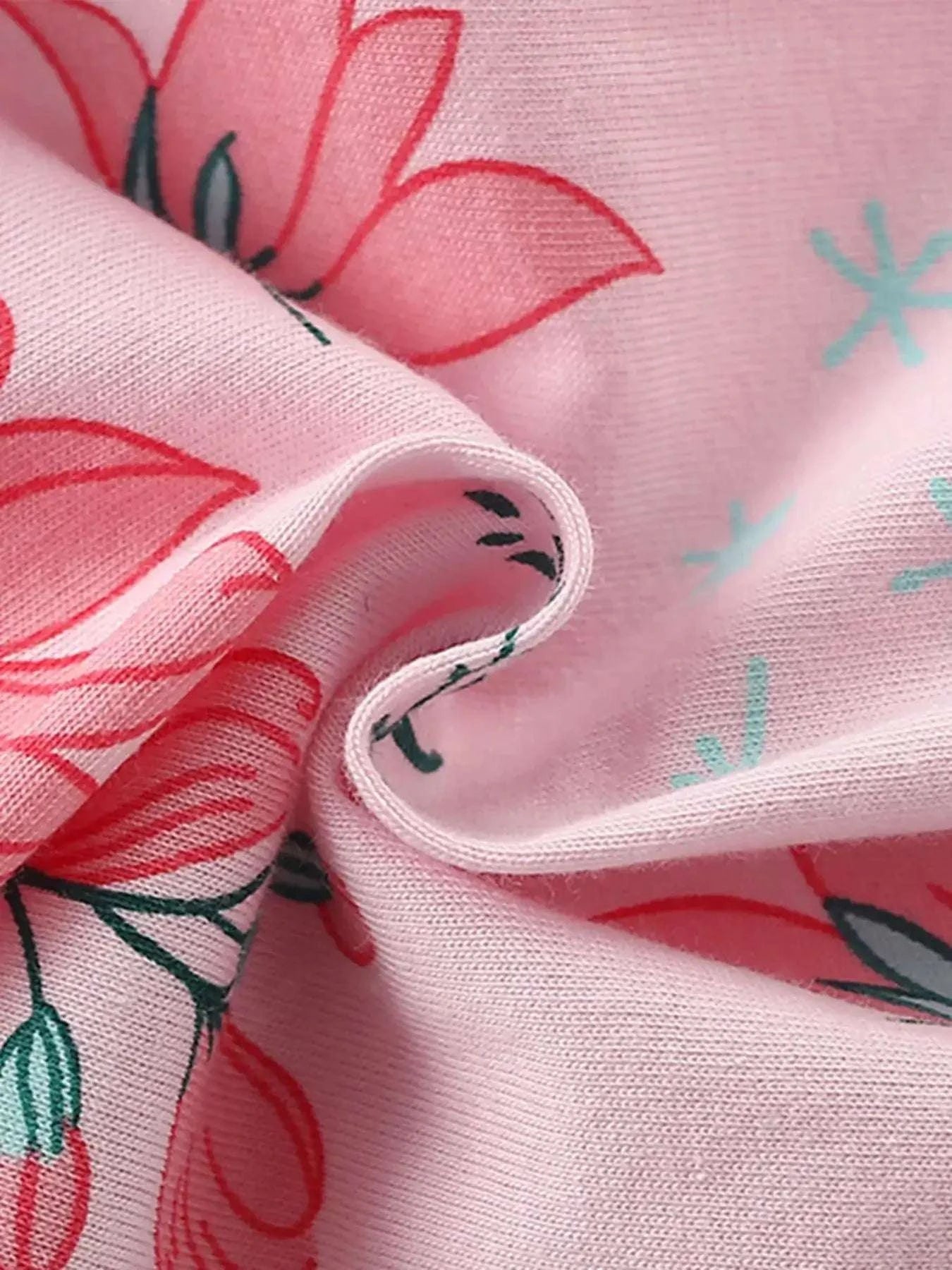Blush pink floral print kids tee fabric with stitched seam detail