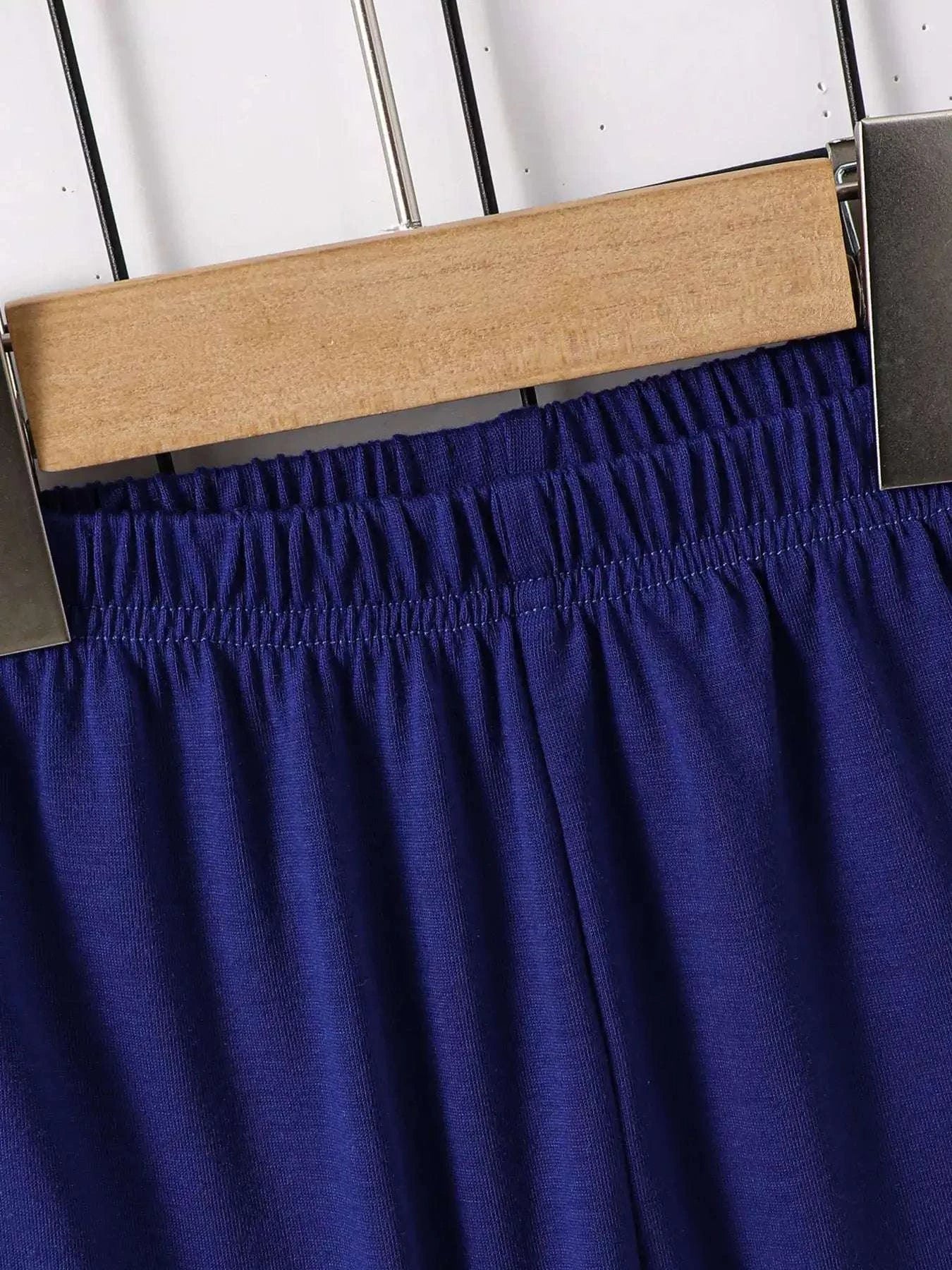 Children's navy-blue shorts with elastic waistband and blue fabric gathered at top