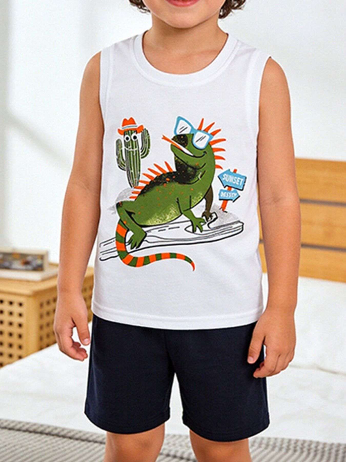Children's lizard tank and shorts set: white sleeveless top, green lizard graphic, navy shorts