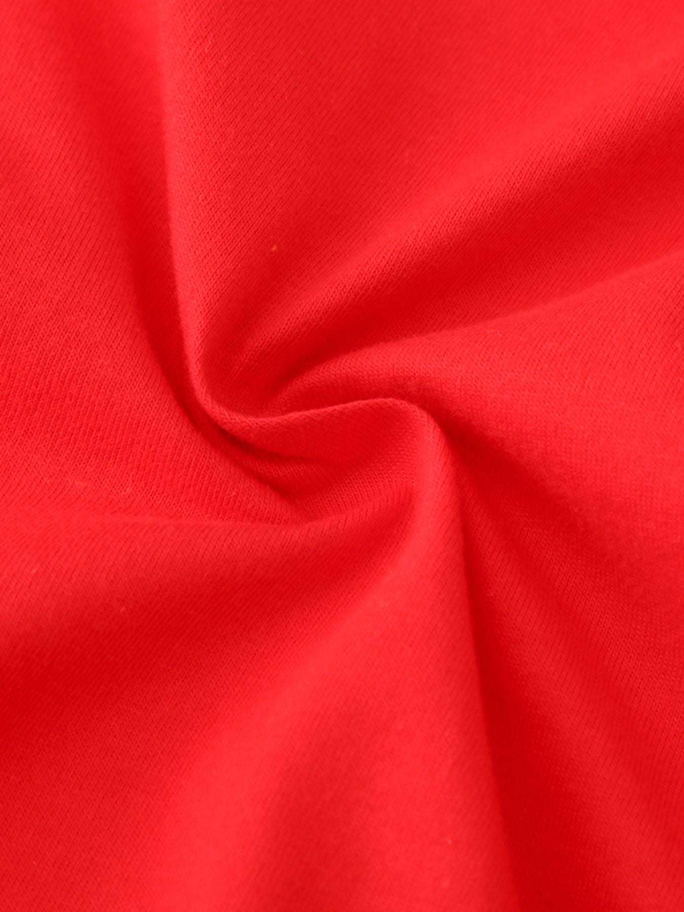 Red knit fabric close-up, soft jersey texture