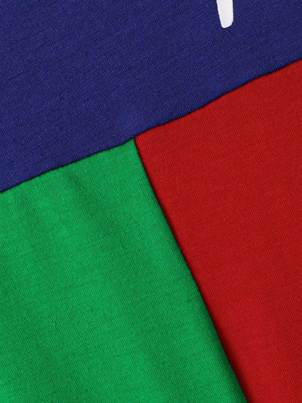 Color block fabric panel detail: blue with red and green sections