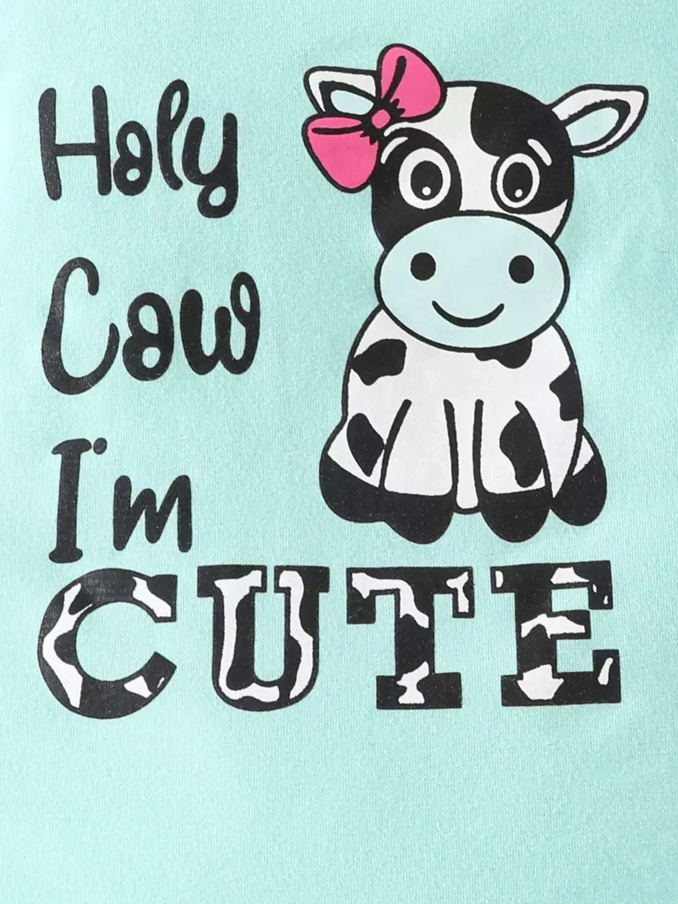 Light blue cow graphic bodysuit with ruffled sleeves, front design close-up