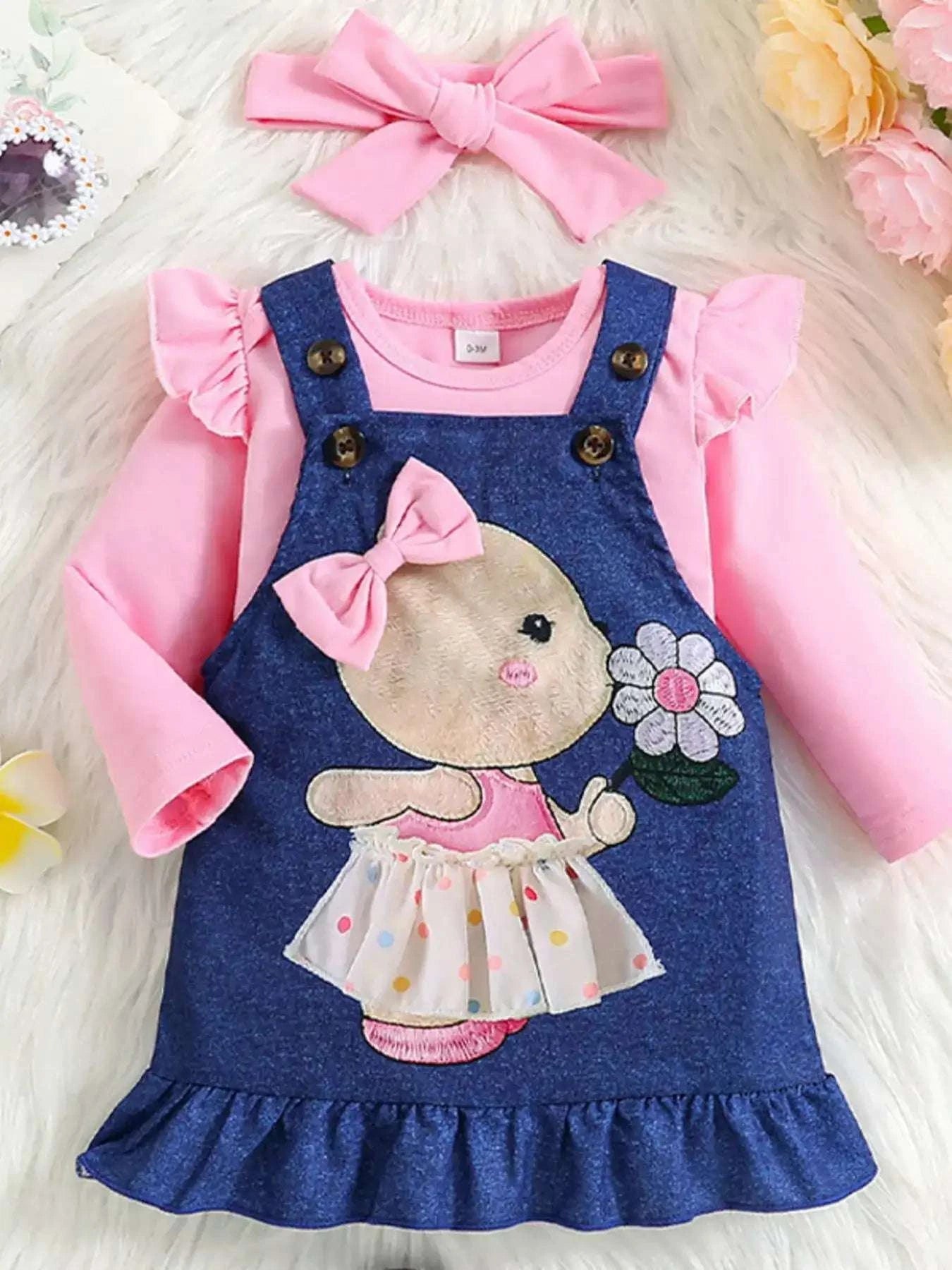 Pink ruffled bodysuit with navy overall dress, rabbit flower graphic