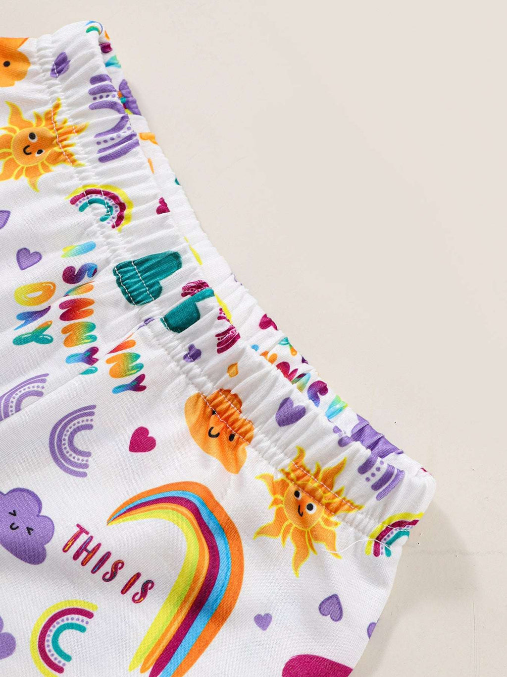 Kids white shorts with purple rainbow and animal print, elastic waistband