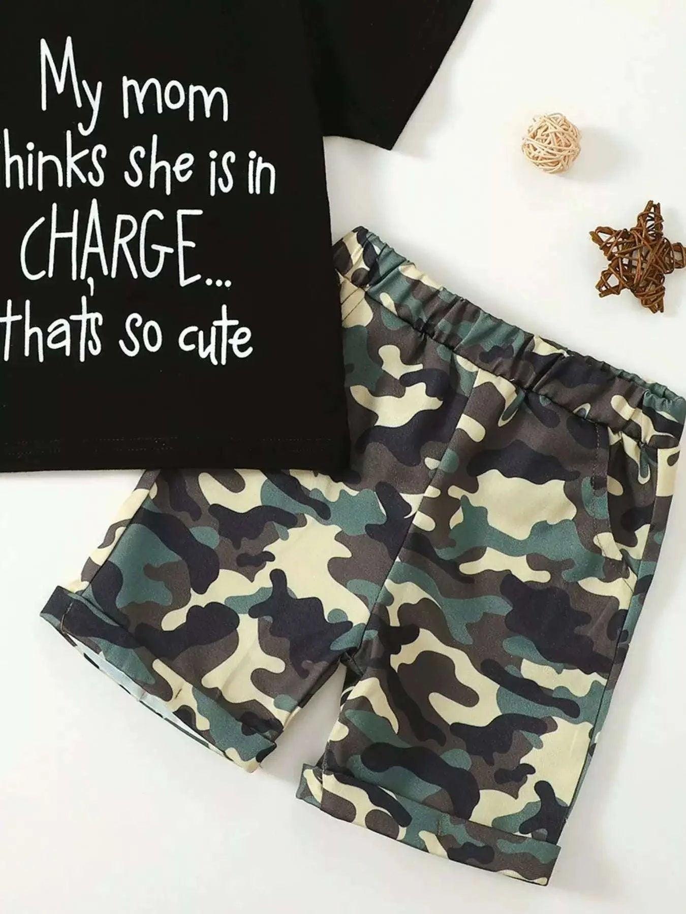 Kids black graphic tee and camouflage shorts set, "My mom thinks she's in CHARGE..."