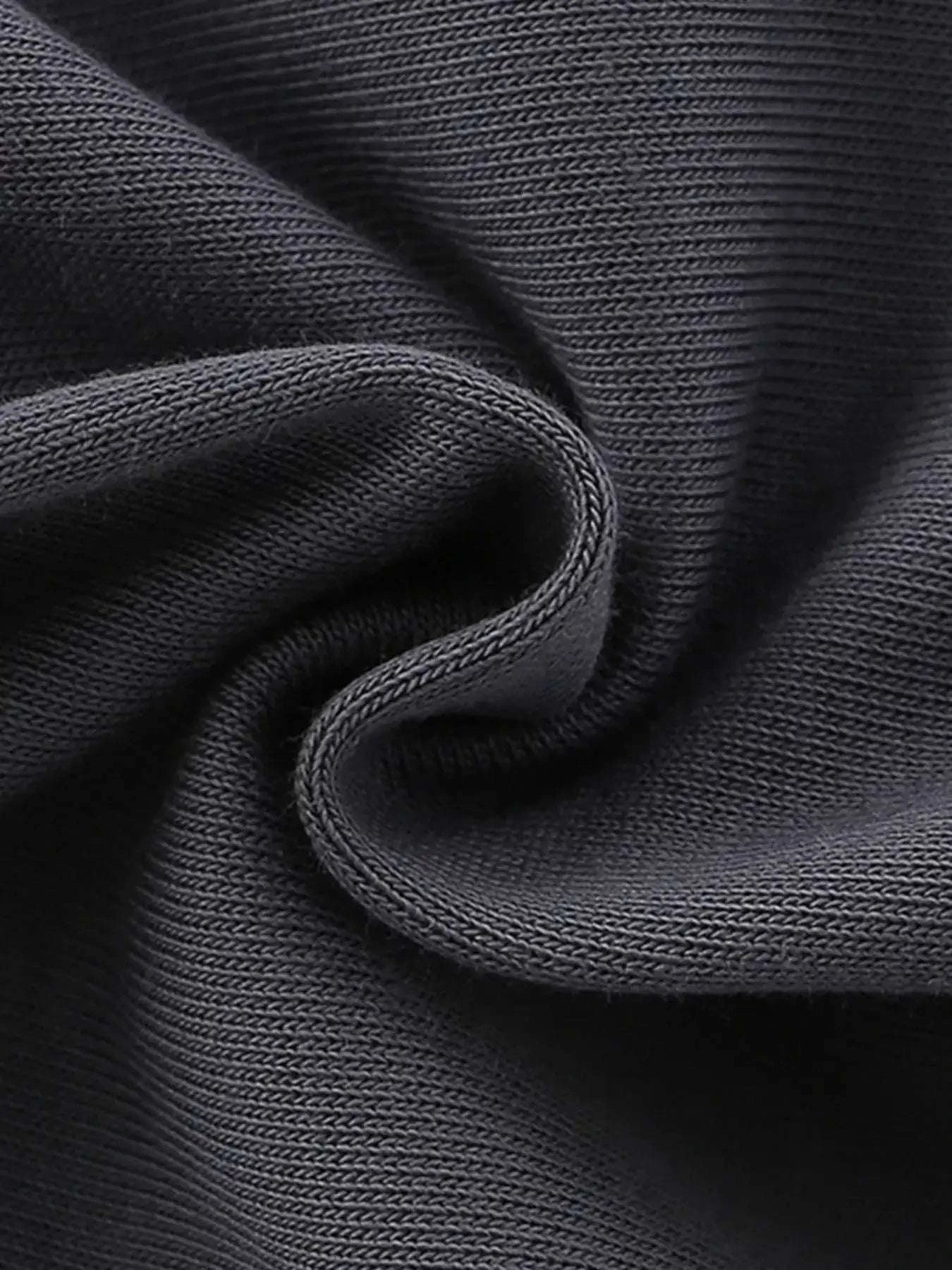 Dark gray knit fabric swatch with stitched texture