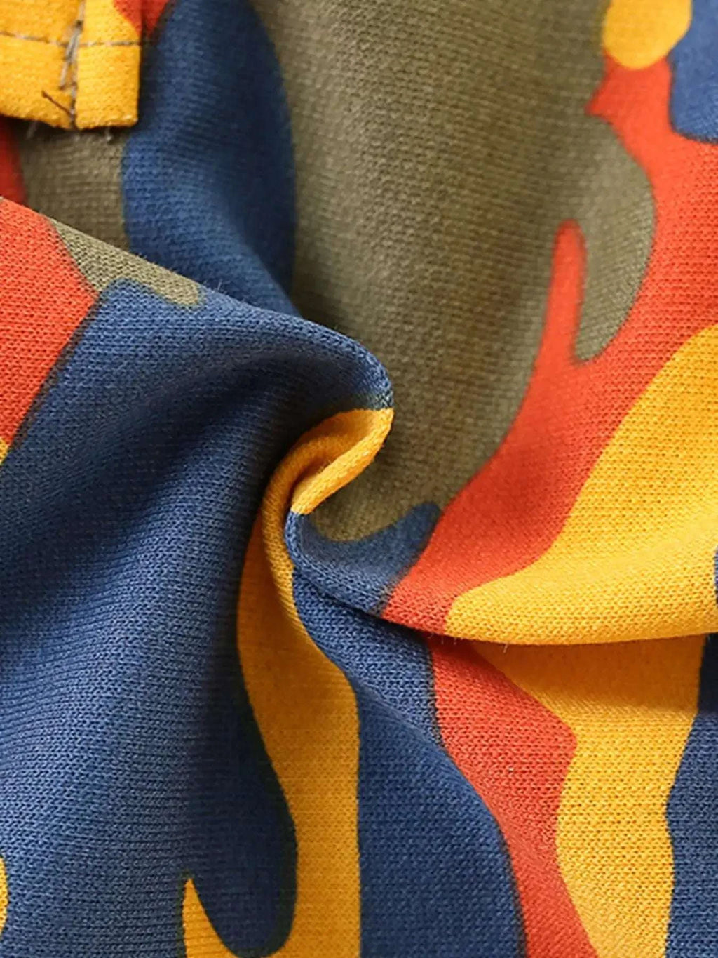 Navy fabric with multicolor cartoon-like print detail