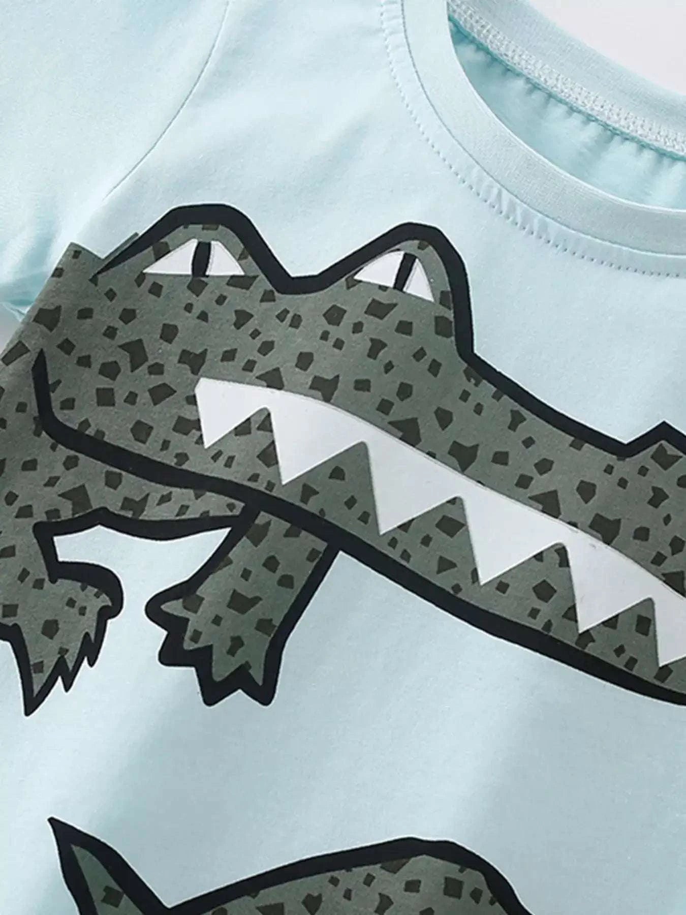 Pastel blue kids' round-neck tee with large crocodile face front print