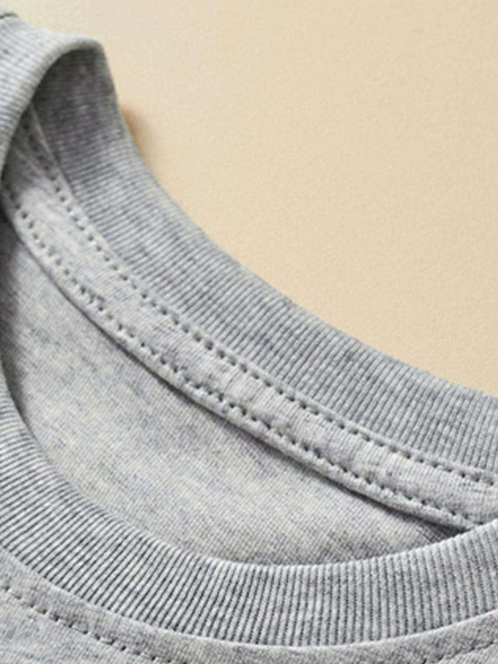 Gray ribbed crew neckline of children's short-sleeve tee