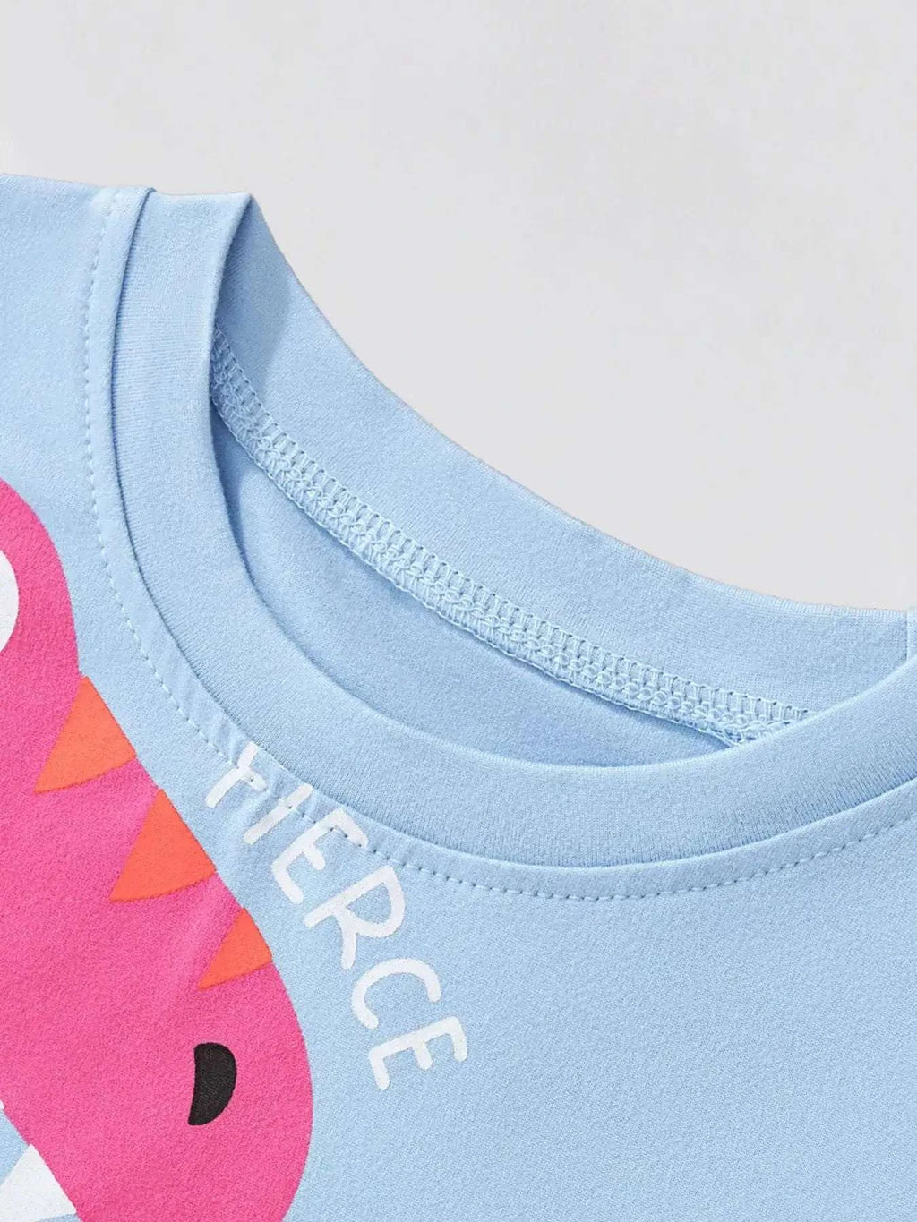 Light blue crew neck T-shirt with cartoon animal face and partial 'FOREVER' text