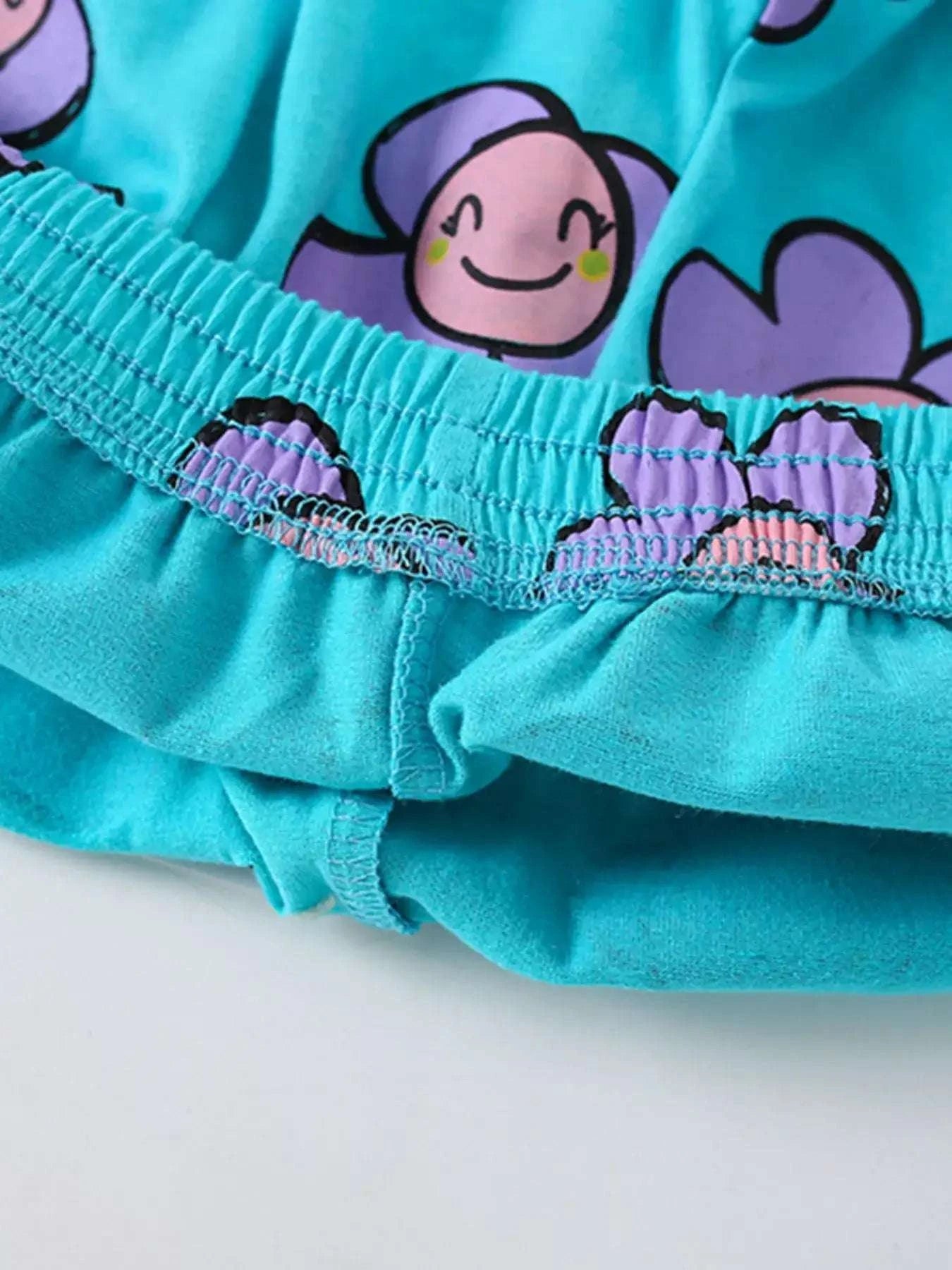 Children's aqua shorts with elastic waistband and cartoon character print