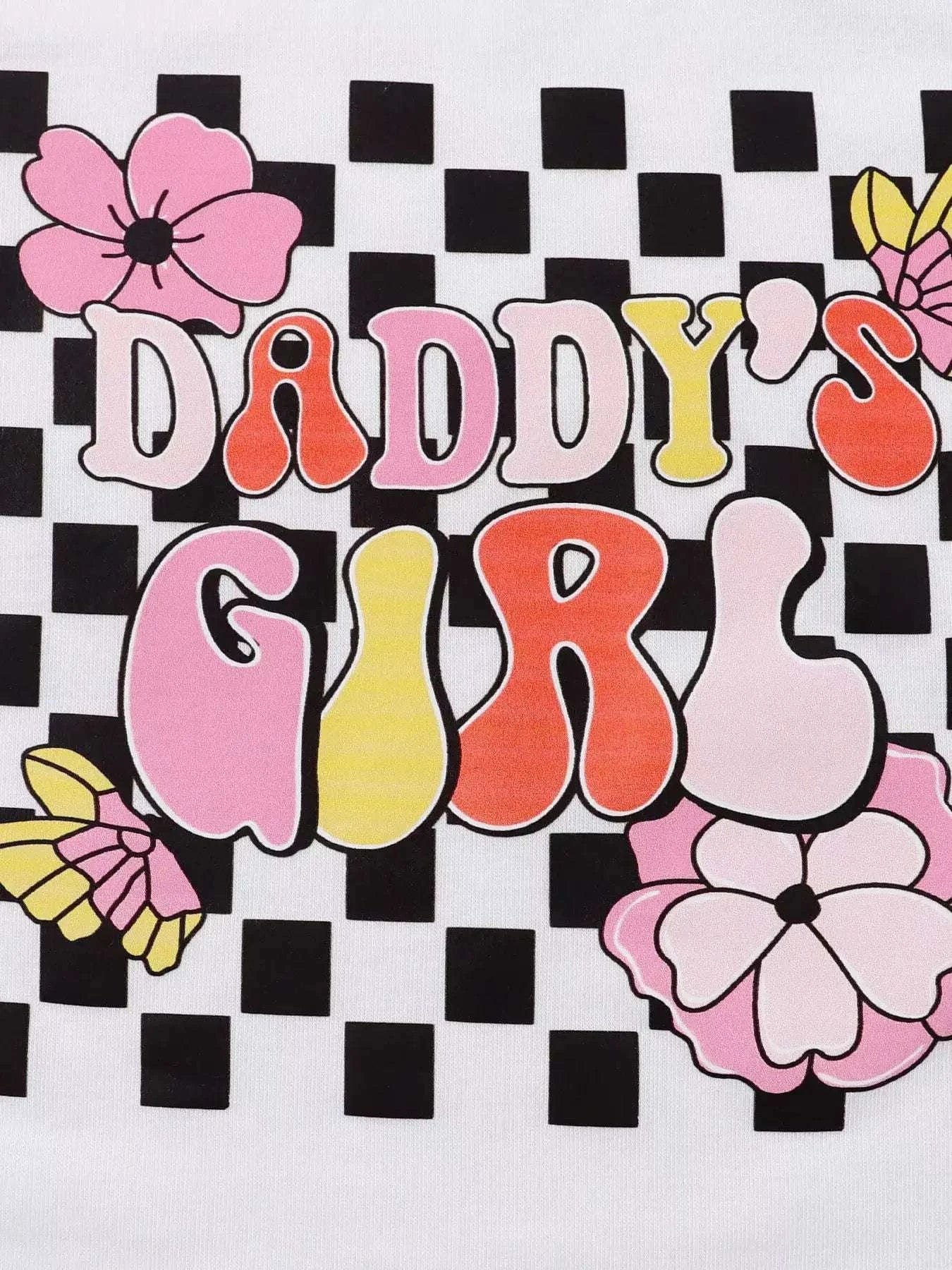 Close-up of kids tee graphic with “Daddy’s Girl” lettering and flower details