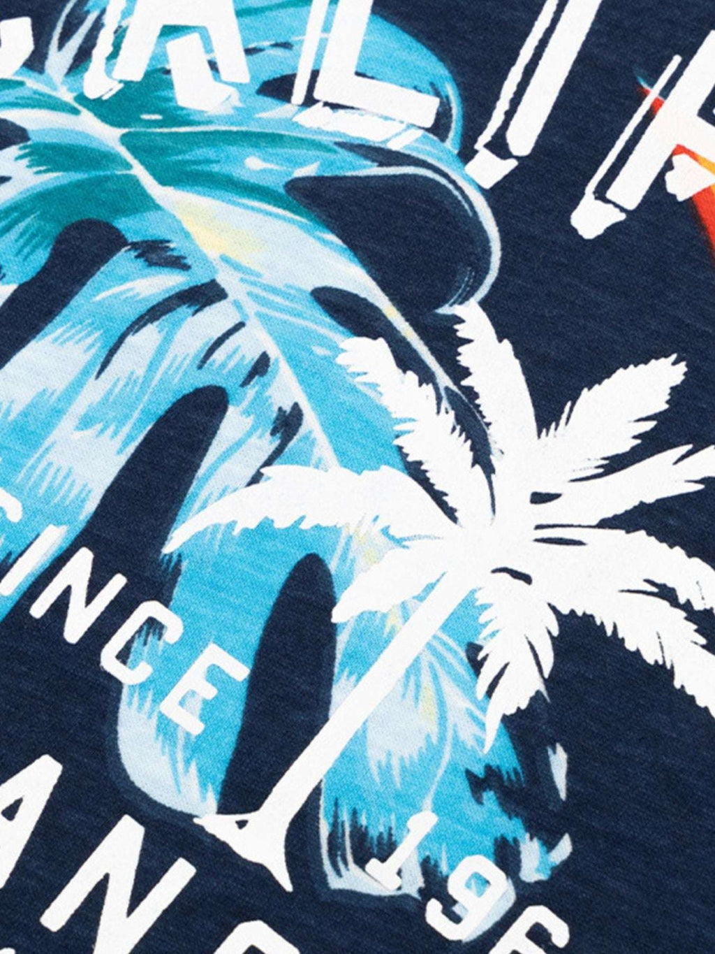 Navy kids T-shirt close-up of blue palm leaf and white graphic print