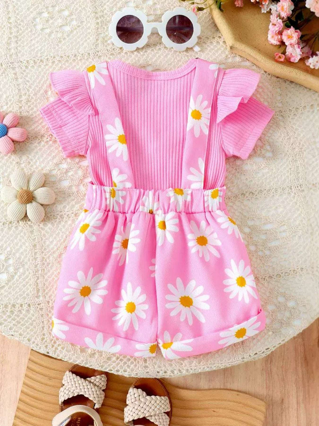 Pink daisy print outfit set: ribbed top with ruffle sleeves and short overalls