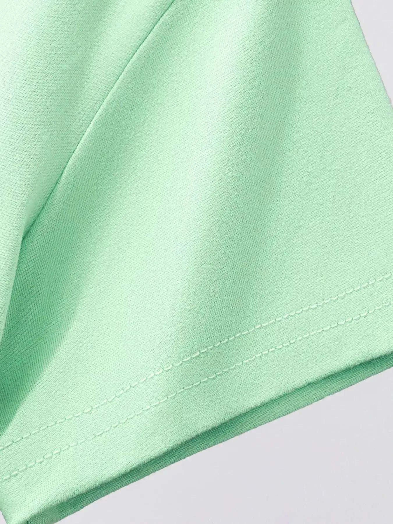 Neon green kids T-shirt with short sleeves and curved hem stitching