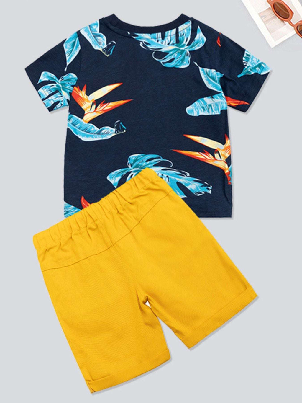 Kids printed tee and shorts set, navy bird-and-leaf print with yellow drawstring shorts