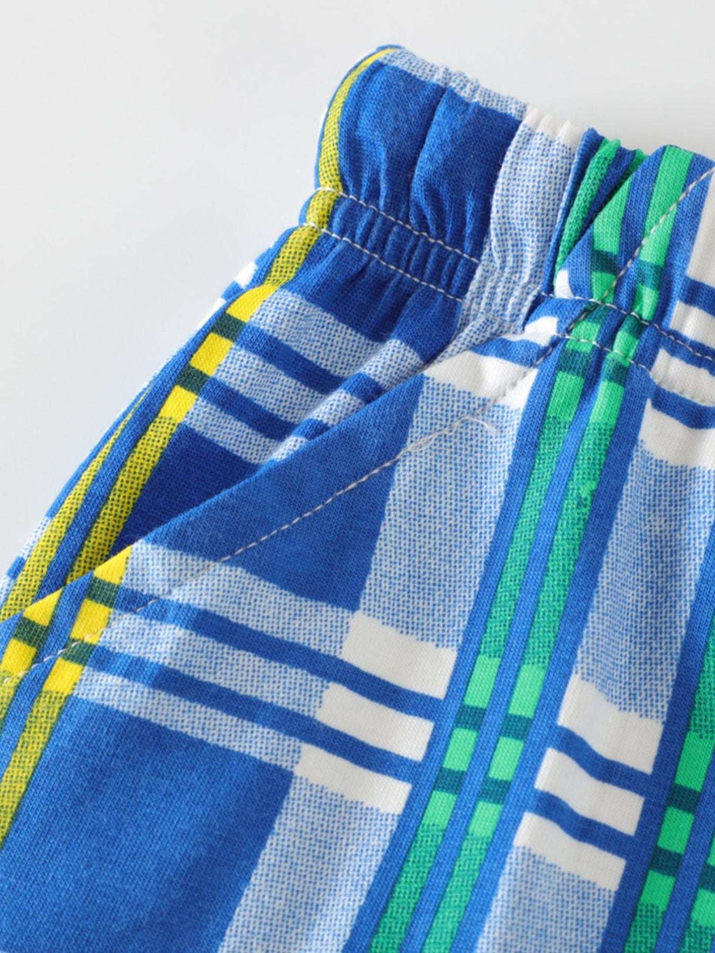 Blue plaid shorts with elastic waistband and multicolor stitched trim