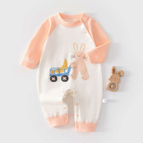 Peach and white baby romper with bunny and small animal graphic, snap-button legs
