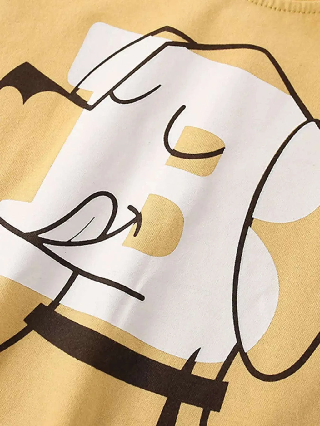 Gold kids T-shirt with large dog graphic print in black and white