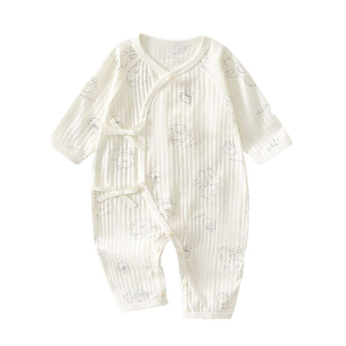 Baby footed pajama romper, white with subtle striped pattern and small animal prints