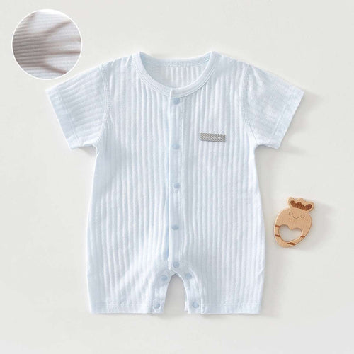 Baby short-sleeve summer jumpsuit, white striped knit, button-front romper; fabric close-up.