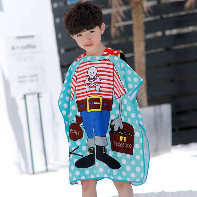 Kids hooded beach towel, turquoise with cartoon astronaut graphic