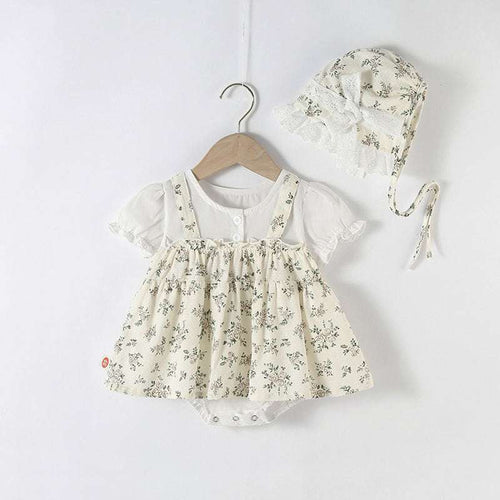 Cream floral short-sleeve romper on hanger with matching lace headband
