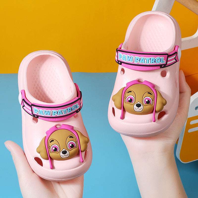 Kids' croc-style Paw Patrol slippers, pale pink clogs with Paw Patrol strap and dog face.