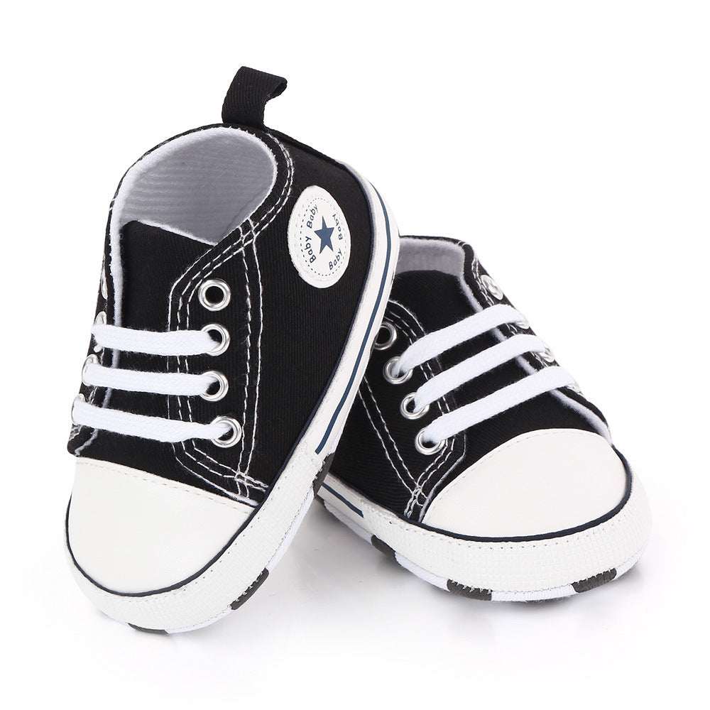 Toddler canvas sneakers, black with white laces and toe, lace-up soft sole star patch