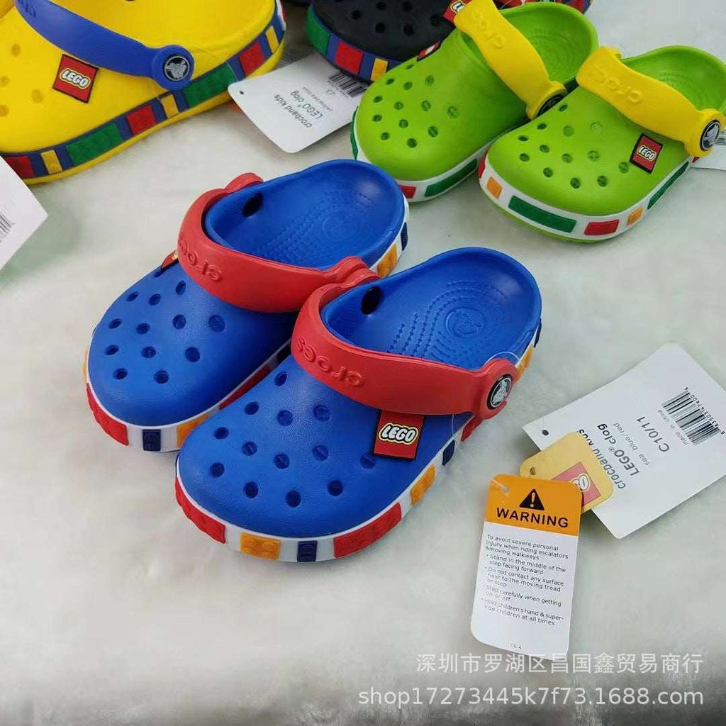 Kids blue perforated clogs sandals with red collar and heel strap, white side sole