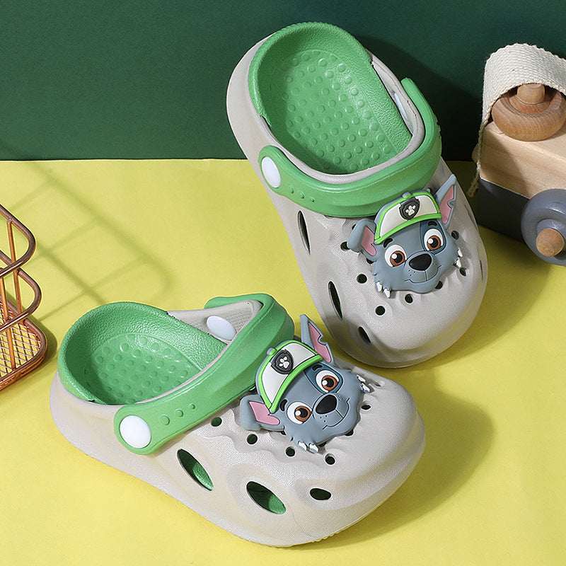 Kids' croc-style Paw Patrol slippers, white with green top and cutout holes, dog face.