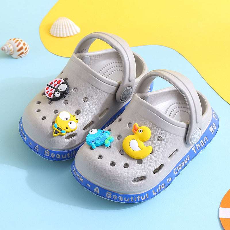 Kids’ light gray slip-on clogs with animal stickers and perforated ventilation holes