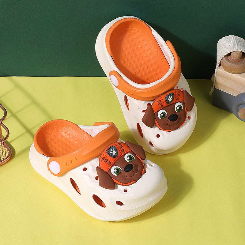Kids' croc-style Paw Patrol slippers, white clogs with orange trim and dog face.