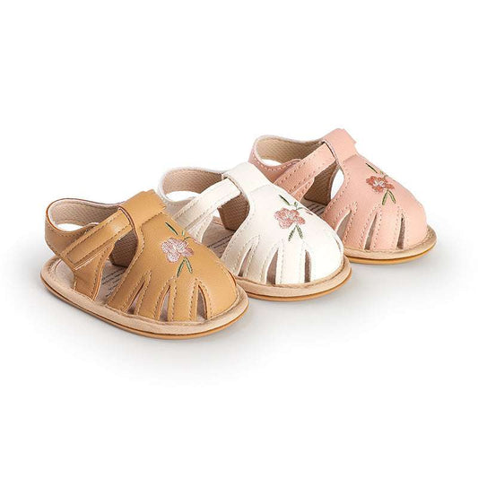 Infant baby walking sandals in apricot, white, and pink with flower embroidery